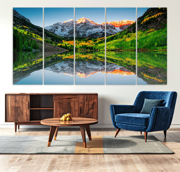 The Sunrise Maroon Bells Lake Wall Art Print beautifully captures North Maroon Peak mirrored in the tranquil lake, framed by lush greenery.