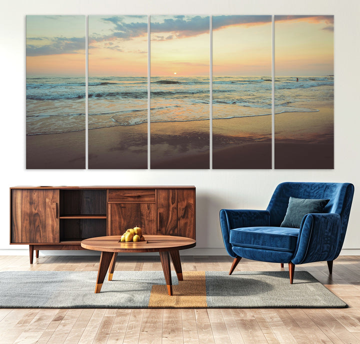 Warm sunset over gentle ocean waves with pastel sky and reflections on wet sand, creating a calm and soothing beach ambiance.