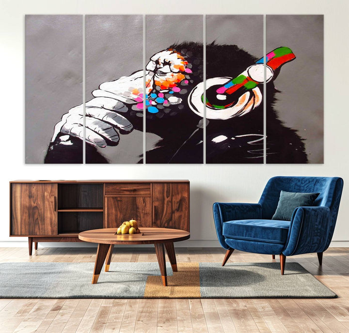 A vibrant triptych, the "DJ Monkey Listening to Music" wall art print, features a Banksy-inspired large canvas adorned with colorful modern pop art. This striking piece elegantly enhances the room with its dynamic and lively depiction.