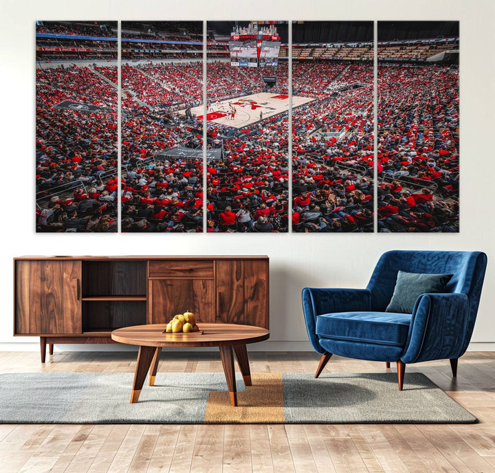 A painting of Louisville Cardinals fans in red at the KFC Yum Center Arena.