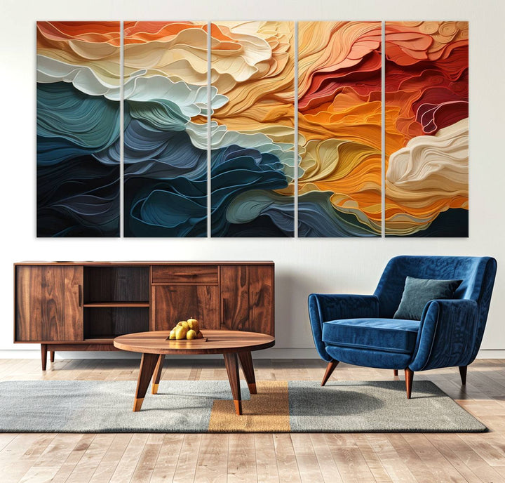 A Blue Orange Abstract Wave Wall Art Canvas Print adorns the wall. This colorful masterpiece is professionally hand-assembled to enhance any space.