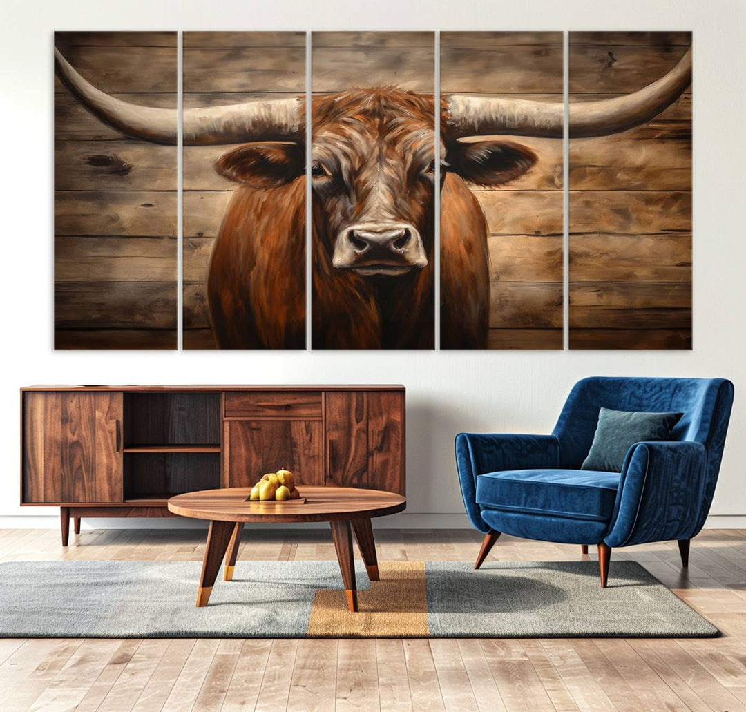 The Longhorn Bull Wall Art, a ready-to-hang canvas print, showcases an image of a brown longhorn cow set against a wooden background, perfect for those looking to enhance their space with rustic farmhouse and western barn decor.