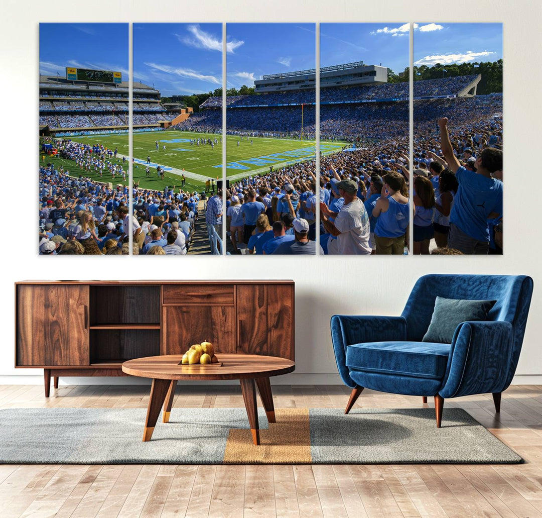 A gallery-quality canvas wall art print featuring the University of North Carolina Tar Heels Football Team and Chapel Hill's Kenan Memorial Stadium adorns the cafe wall.