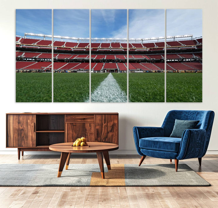 A canvas print of the University of Tulsa Golden Hurricane showcases H.A. Chapman Stadiums football field and red seats against a backdrop of a blue sky.