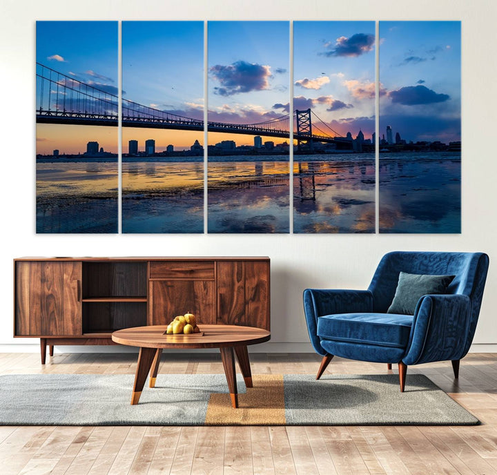 A photograph titled "Large Wall Art Philadelphia Canvas Print - Benjamin Franklin Bridge at Sunset" displays a breathtaking cityscape of the bridge reflected in the water. This image features a gallery-quality finish that promises to transform any space into an evocative memory.