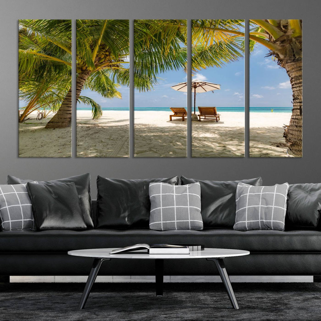 The canvas art print titled Lounge Chairs Palm Trees on Tropical Beach offers free shipping.