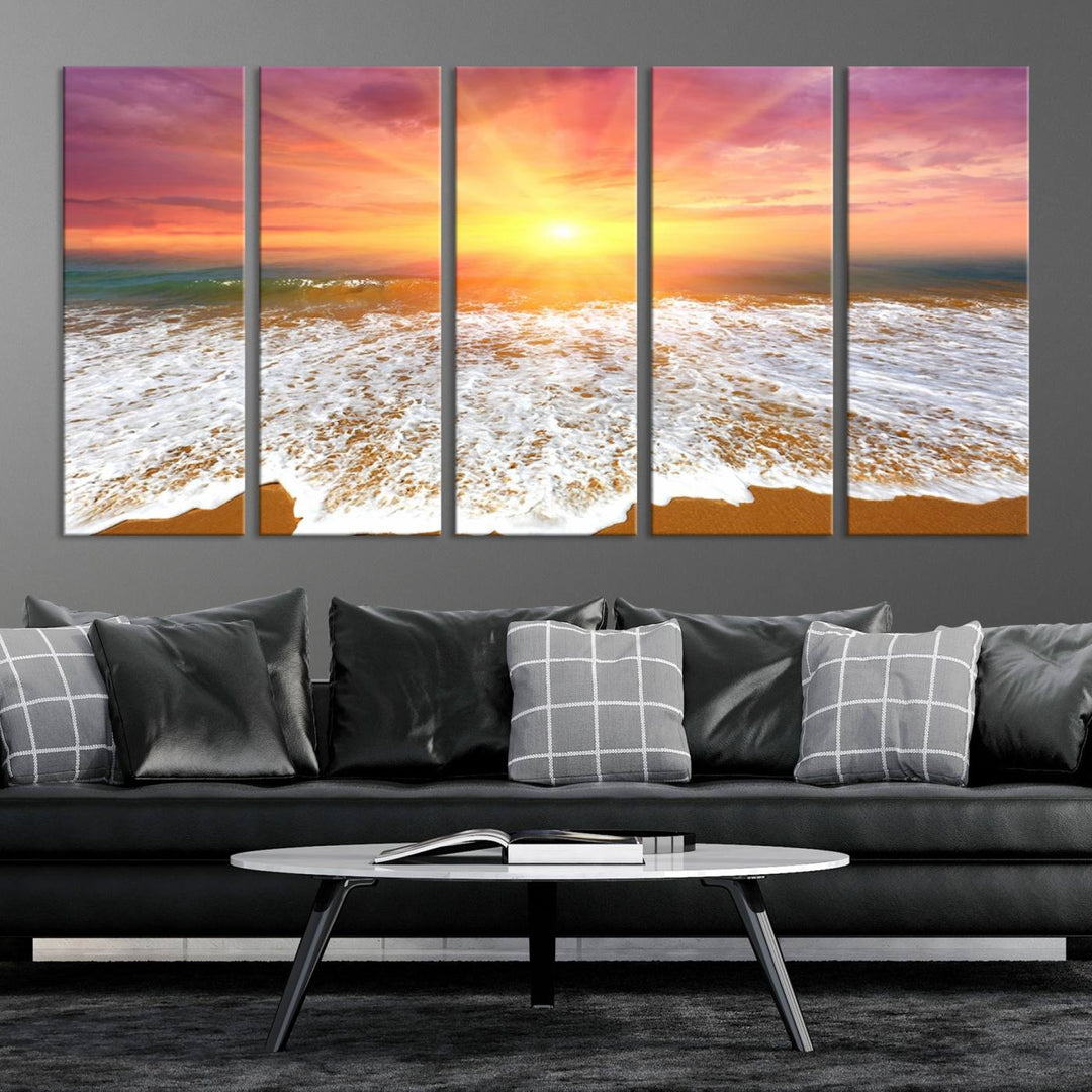 Golden Beach Sunrise 3-panel canvas art of ocean waves, hung on a wooden wall.