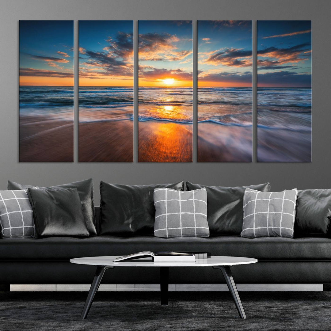 The Sunset on the Ocean canvas adds coastal ambiance to the wooden wall.