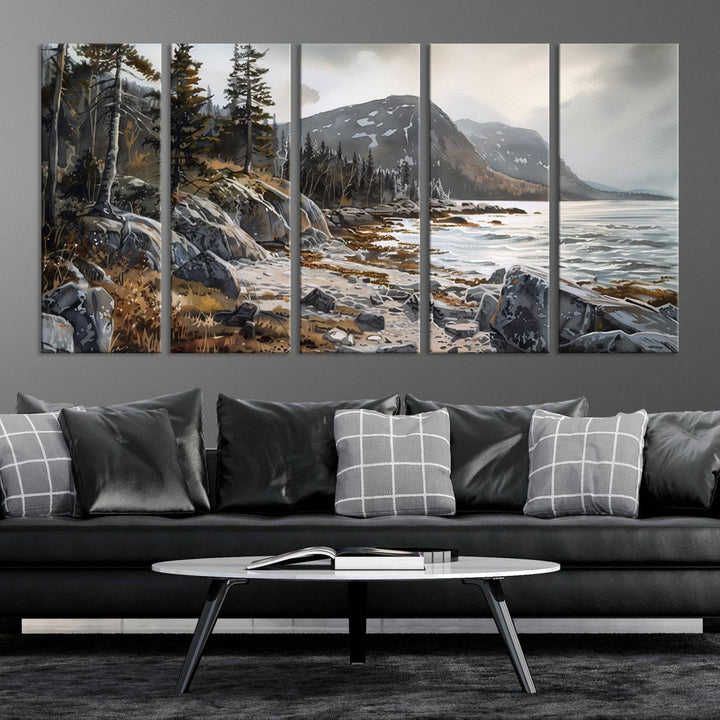 Framed wall art depicting Acadia National Parks rocky coast, trees, mountains, and sunlight over the sea; ready to hang.