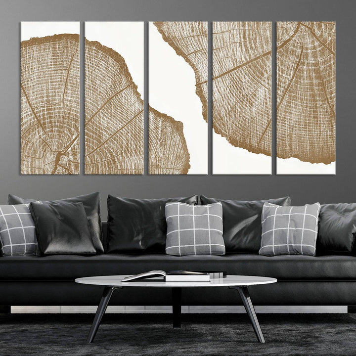 The rustic wall art features two large tree rings, beautifully framed and displayed to create a nature-inspired décor.