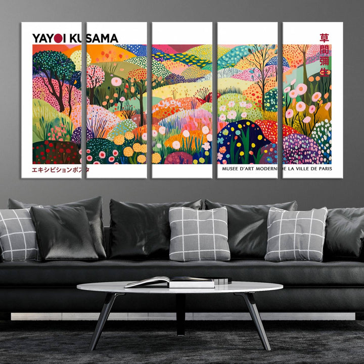 Three vibrant, abstract Yayoi Kusama wall art prints adorn a black wall, creating a perfect blend of contemporary décor.