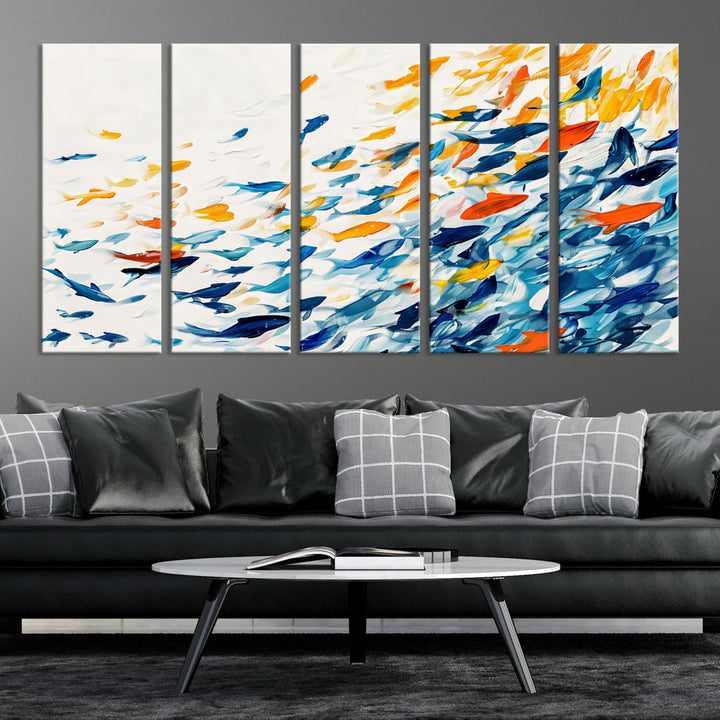 A colorful Abstract Fish Shoal Canvas Print hangs on the wall.