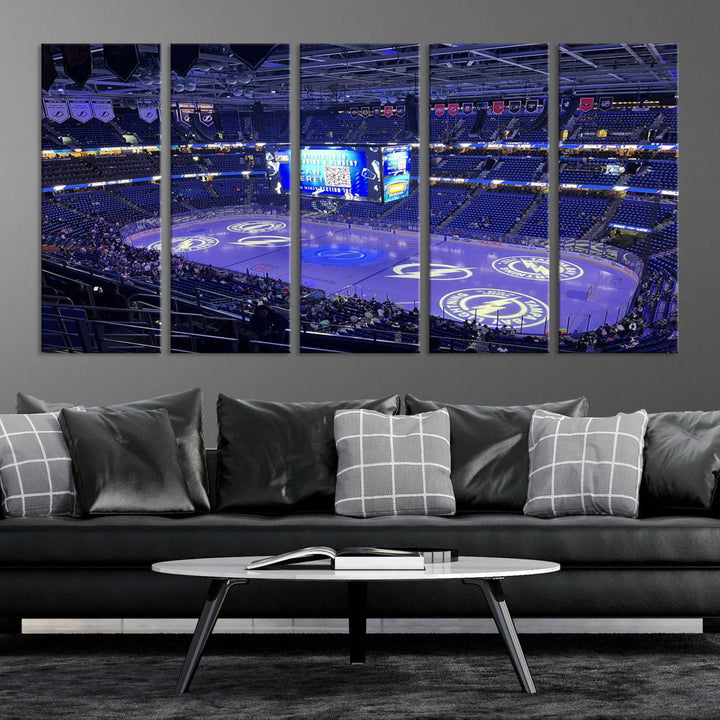 The wall art canvas print at Amalie Arena features team logos on ice, encapsulating the vibrant atmosphere of an NHL hockey stadium.