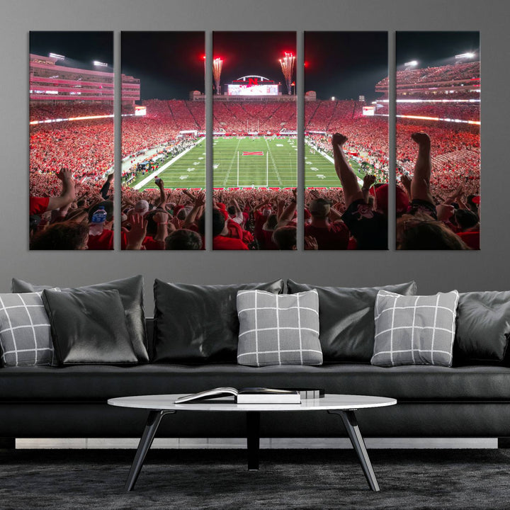 The University of Nebraska Cornhuskers Football Team Print, a vibrant three-panel canvas depicting Lincoln Memorial Stadium filled with enthusiastic fans from the end zone perspective, features a gallery-quality finish.