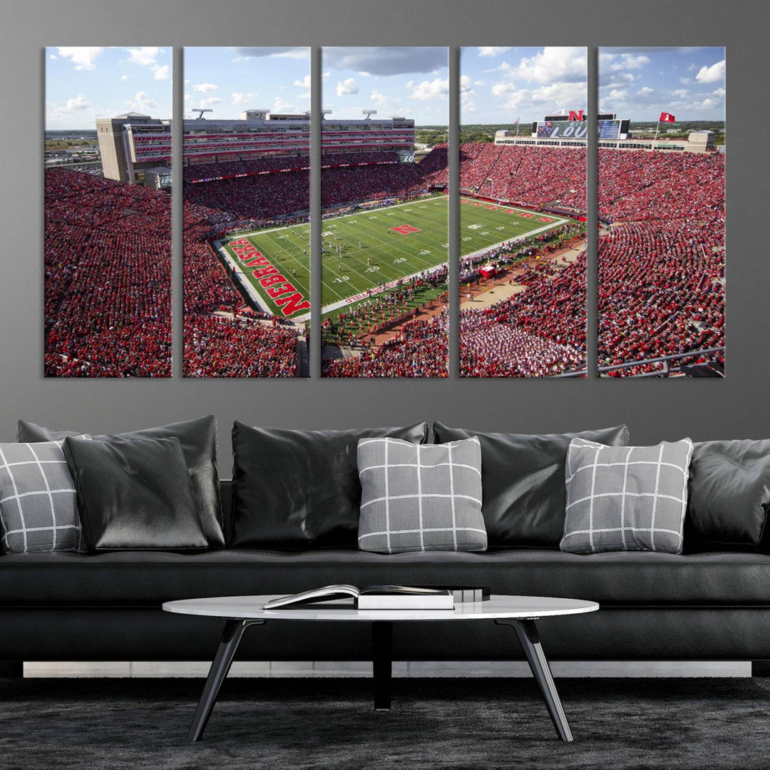 The University of Nebraska Cornhuskers Football Team Print showcases a vibrant triptych of Lincoln Memorial Stadium, depicting a packed football stadium filled with energetic fans. This handmade art piece is crafted in the USA and printed on premium canvas for a gallery-quality finish.