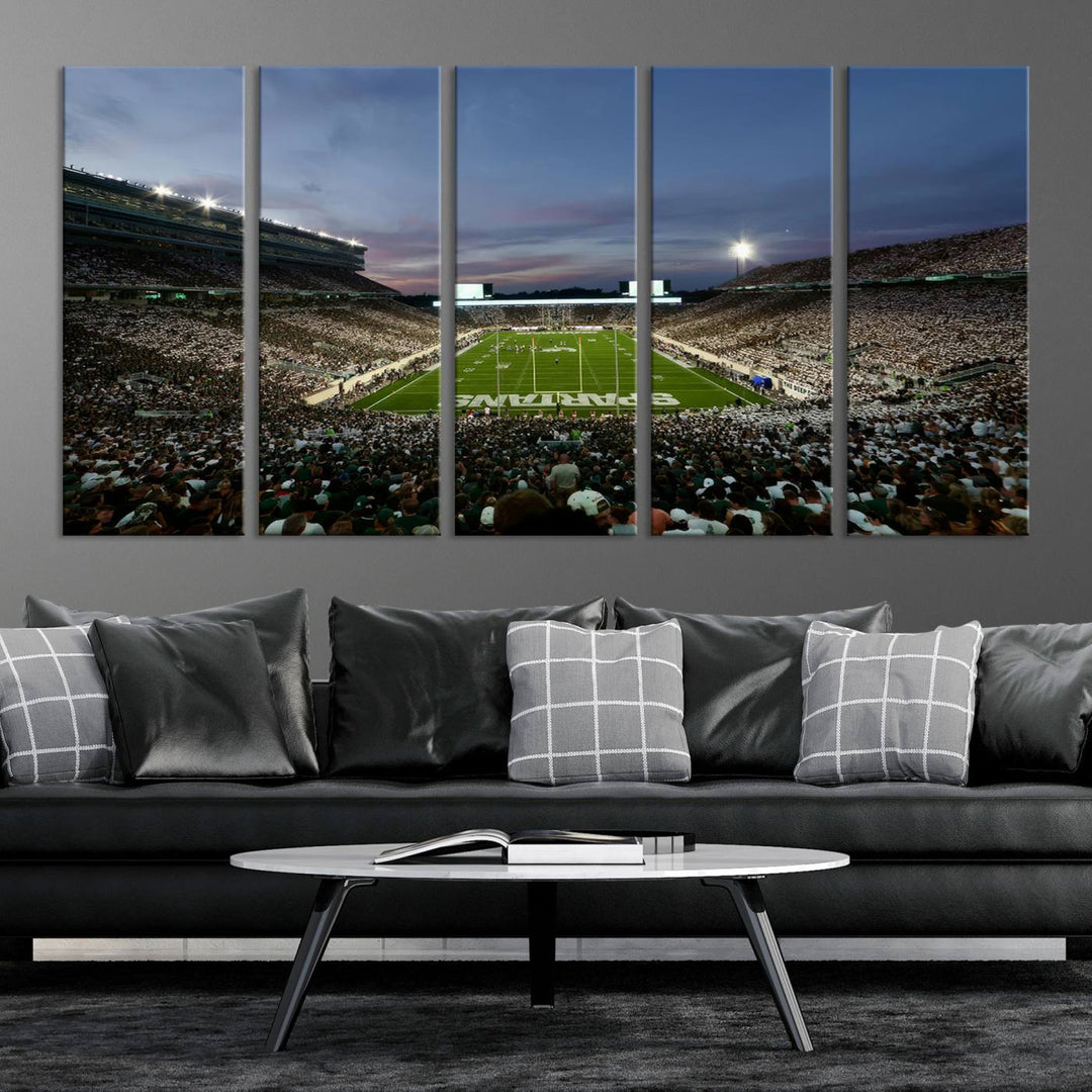 Wall art featuring a stadium at dusk with full stands—ideal for the Michigan State Spartans Football Team Canvas Print.