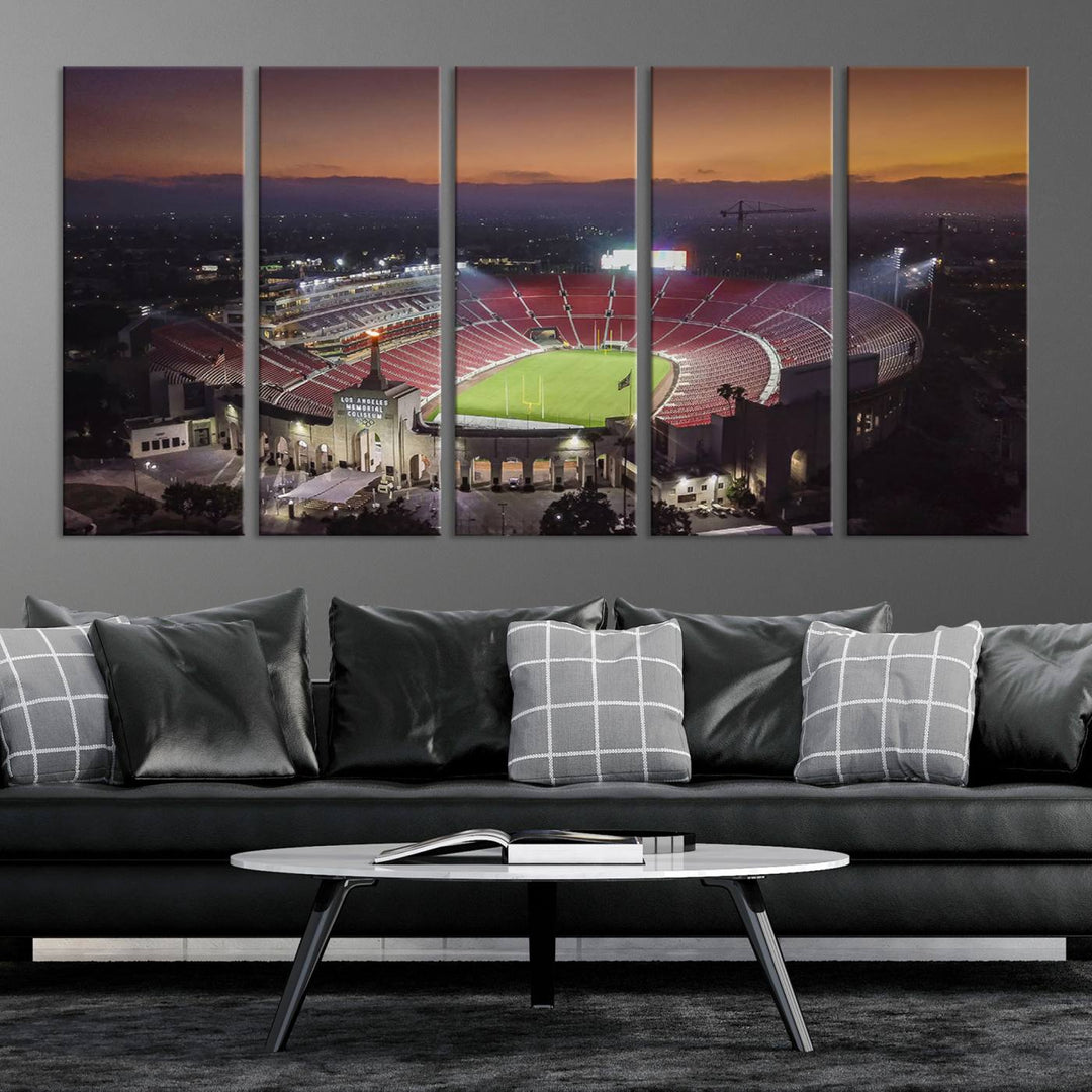 The USC Trojans Stadium canvas captures Memorial Coliseum at twilight, showcasing red seats and a green field beneath an orange sky.