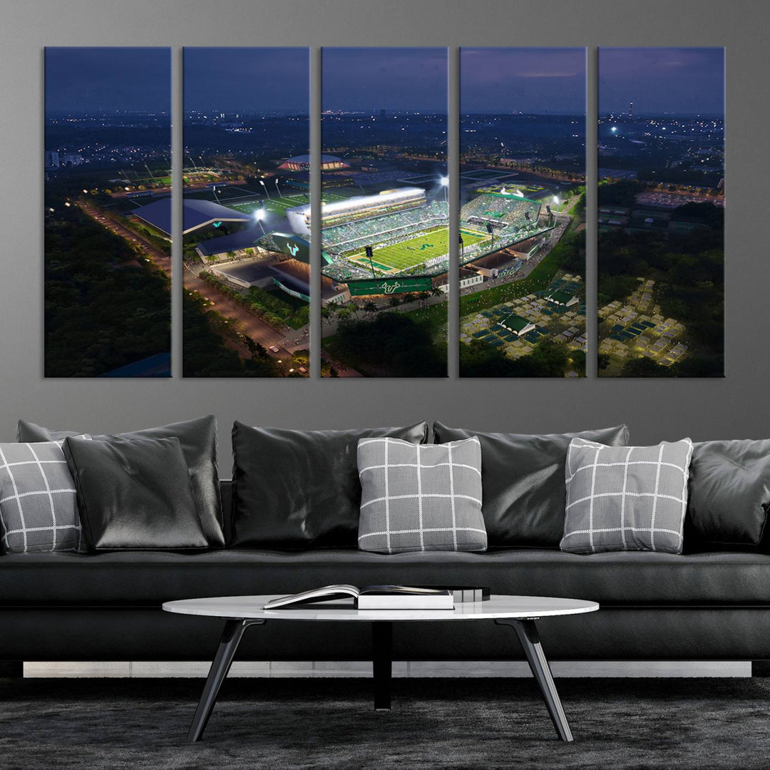 The USF Bulls Football Team Wall Art Canvas Print showcases the Tampa USF Football Stadium at night with city lights.