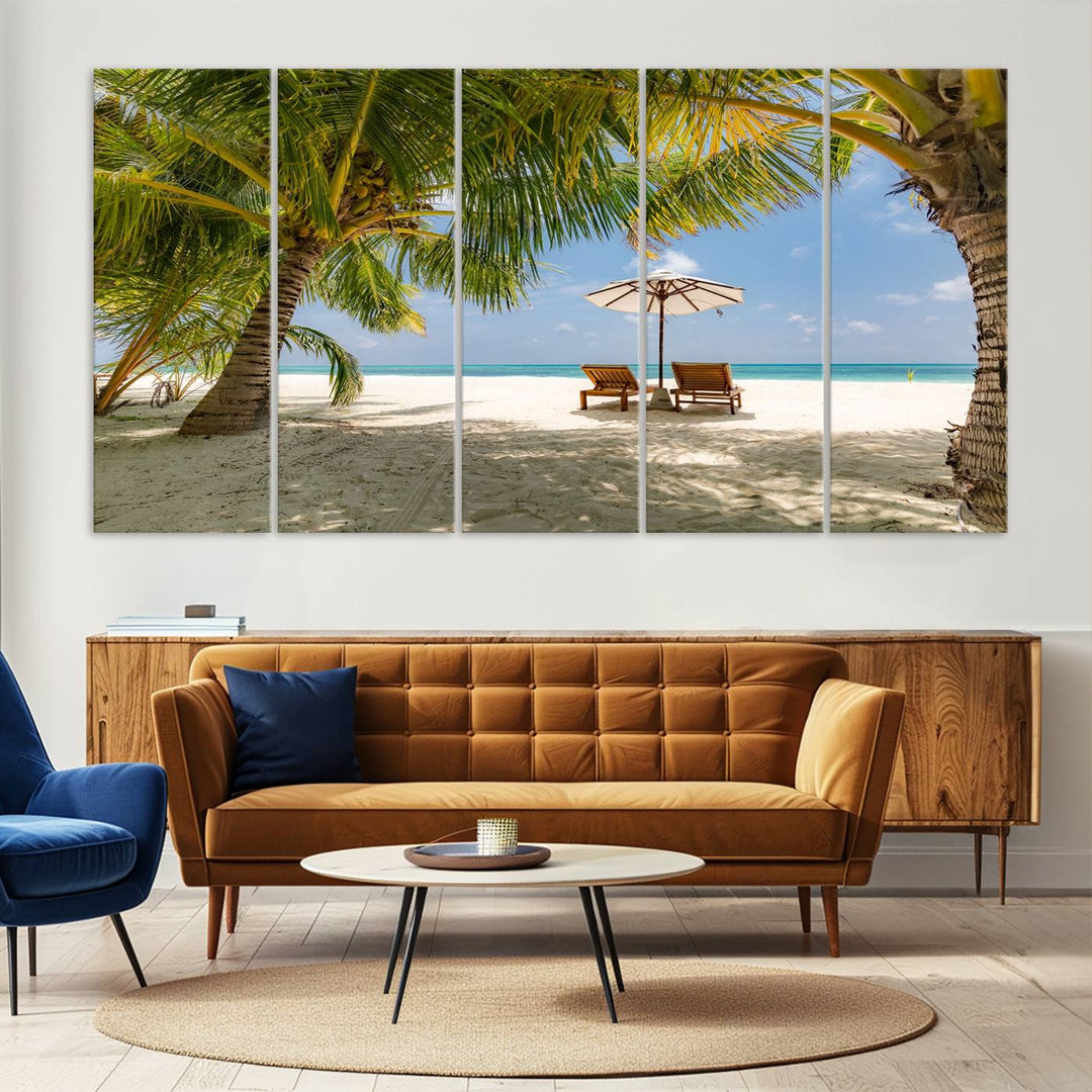 The canvas art print titled Lounge Chairs Palm Trees on Tropical Beach offers free shipping.