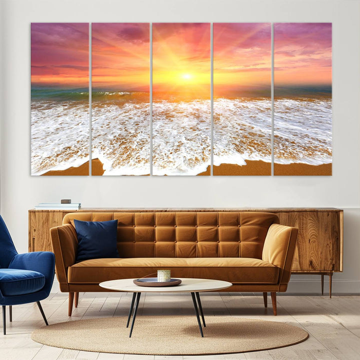 Golden Beach Sunrise 3-panel canvas art of ocean waves, hung on a wooden wall.