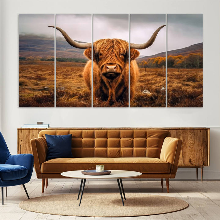 Highland Cow Longhorn Canvas Print, framed, on a wooden wall.