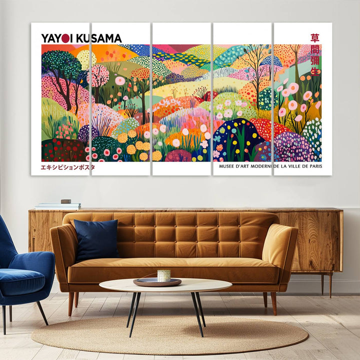 Three vibrant, abstract Yayoi Kusama wall art prints adorn a black wall, creating a perfect blend of contemporary décor.