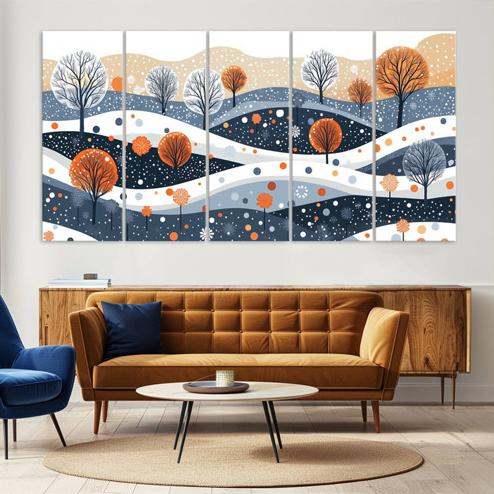 The "Abstract Winter Landscape Canvas Wall Art Print," featuring a triptych of landscapes with trees and hills in vibrant orange, white, and blue hues, adds a gallery-quality finish that transforms the space into an art lover's dream.