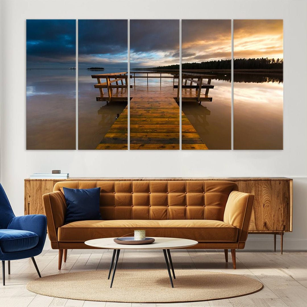 The "Serene Lake Pier at Sunset" landscape canvas print, crafted as ready-to-hang and framed wall art, enriches the contemporary setting by capturing the tranquility of a lakeside pier at sunset.