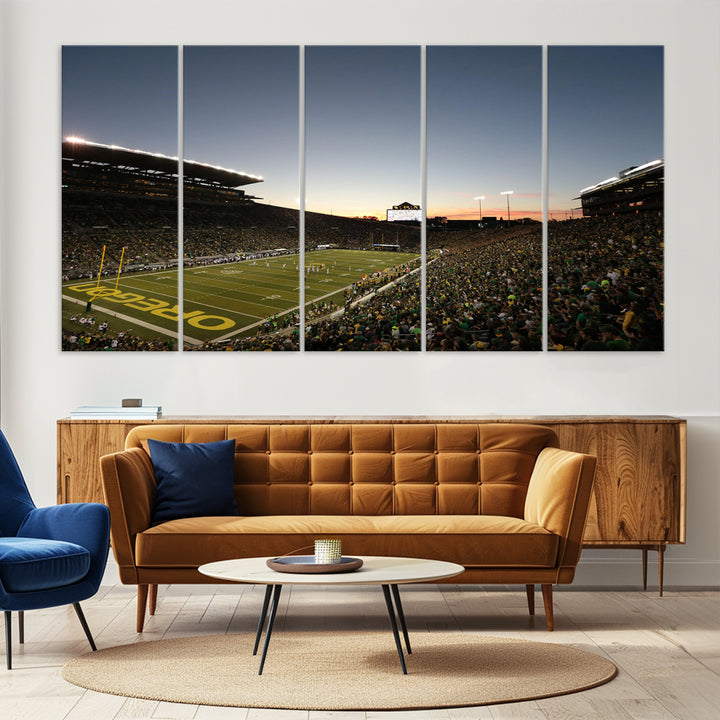 Canvas artwork depicting an Oregon Ducks football game at Autzen Stadium, capturing a sunset and packed stands.