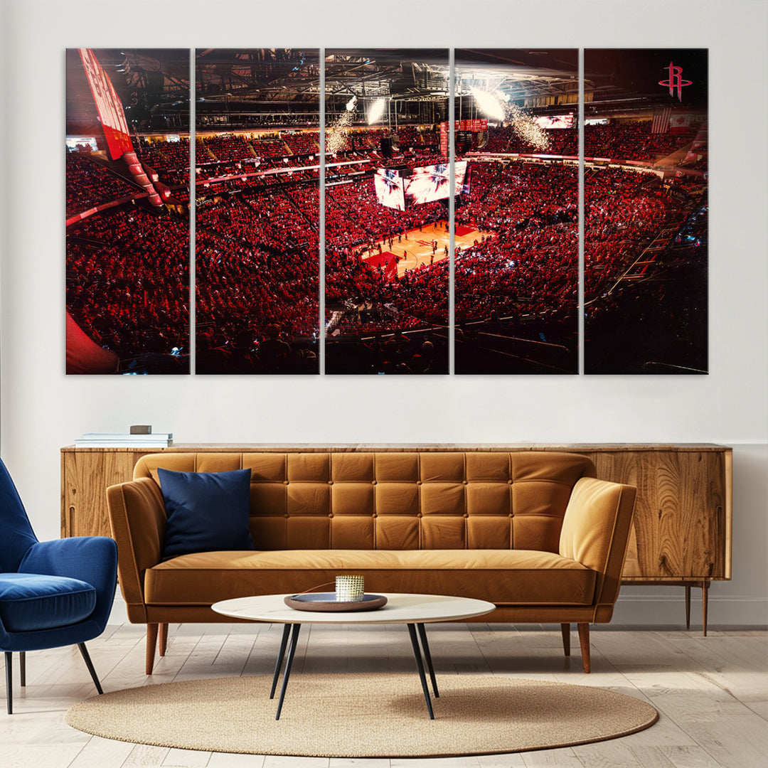 A crowded basketball arena with red lighting hosts a Houston Rockets game.