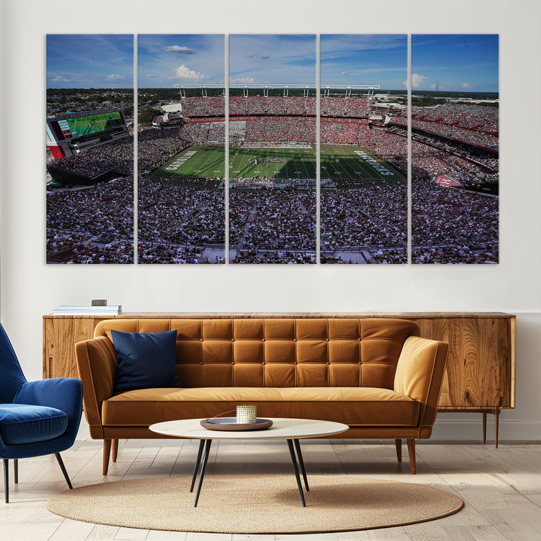 The wall art is a South Carolina Gamecocks print, showcasing Williams-Brice Stadium from a distance under clear skies.