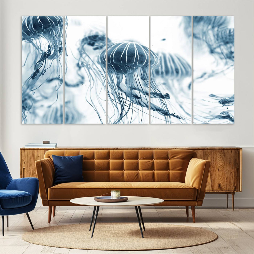 The "Abstract Jellyfish Wall Art Canvas Print" in high resolution is beautifully displayed as a triptych on a dark wall. Experience museum-quality canvas and enjoy free shipping with this stunning piece.