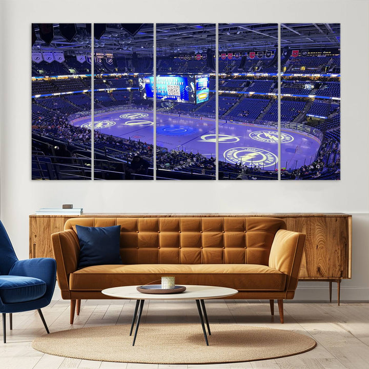 The wall art canvas print at Amalie Arena features team logos on ice, encapsulating the vibrant atmosphere of an NHL hockey stadium.