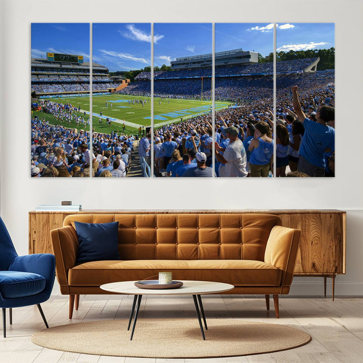 A gallery-quality canvas wall art print featuring the University of North Carolina Tar Heels Football Team and Chapel Hill's Kenan Memorial Stadium adorns the cafe wall.