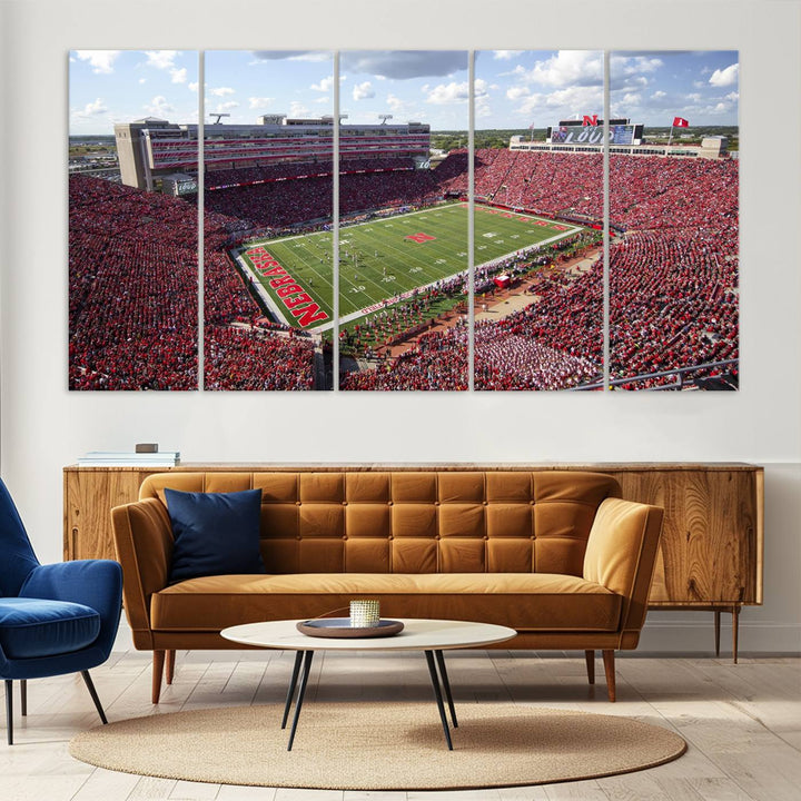 The University of Nebraska Cornhuskers Football Team Print showcases a vibrant triptych of Lincoln Memorial Stadium, depicting a packed football stadium filled with energetic fans. This handmade art piece is crafted in the USA and printed on premium canvas for a gallery-quality finish.