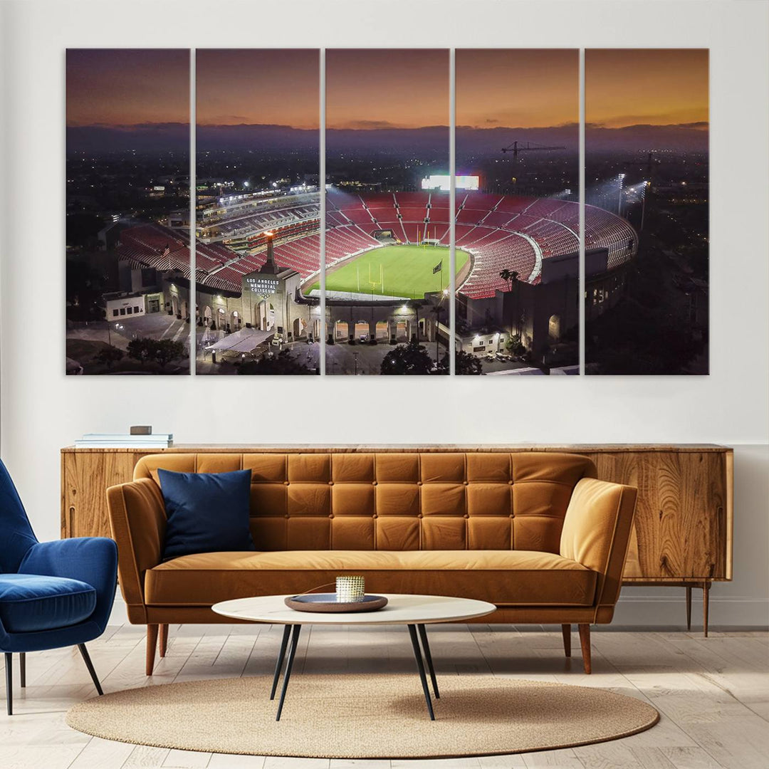 The USC Trojans Stadium canvas captures Memorial Coliseum at twilight, showcasing red seats and a green field beneath an orange sky.