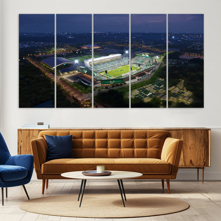 The USF Bulls Football Team Wall Art Canvas Print showcases the Tampa USF Football Stadium at night with city lights.