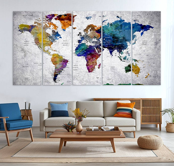 The World Map Art Canvas Print, featuring country names on a grunge-stained gray background, is perfect for stylish home decor.