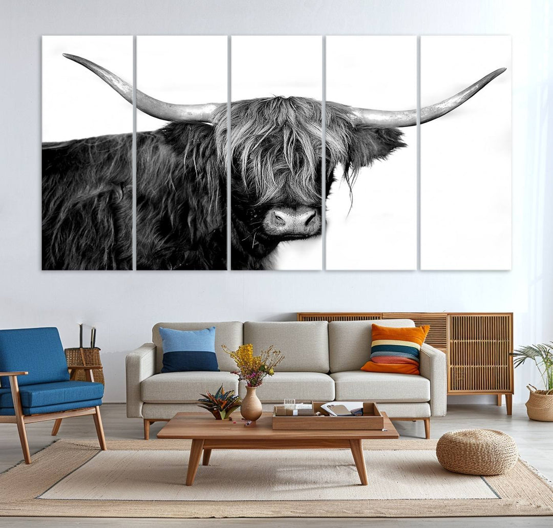 The Black and White Highland Cow Multi Panel Wall Art Canvas Print with UV-protection hangs prominently.