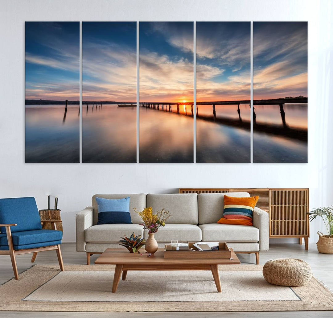 The Sunset Pier Canvas features a serene coastal landscape with vibrant hues under cloudy skies, ideal for modern decor.