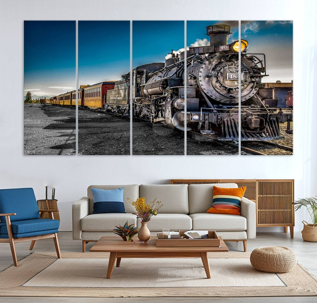 The Train Wall Art Canvas Print features a vintage steam train with a bright headlight.