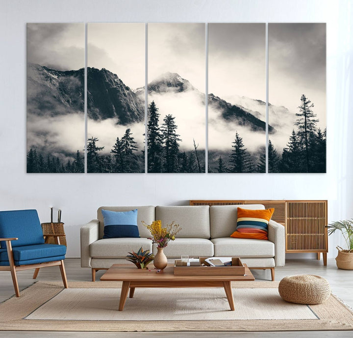 A large foggy mountain forest canvas print hangs prominently in the room.