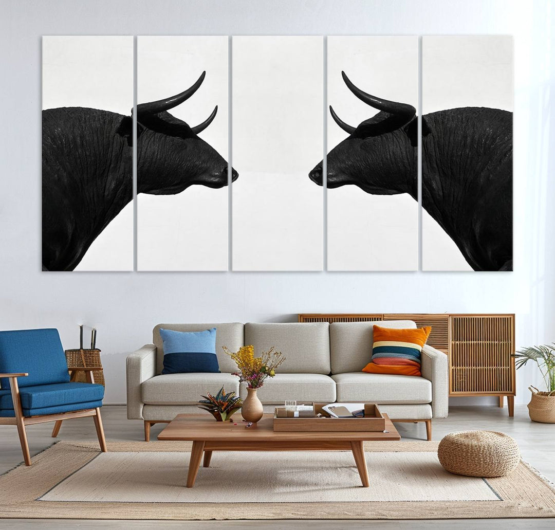 Spanish Bull Wall Art Canvas Print: Two black bull heads facing off on museum-quality canvas.