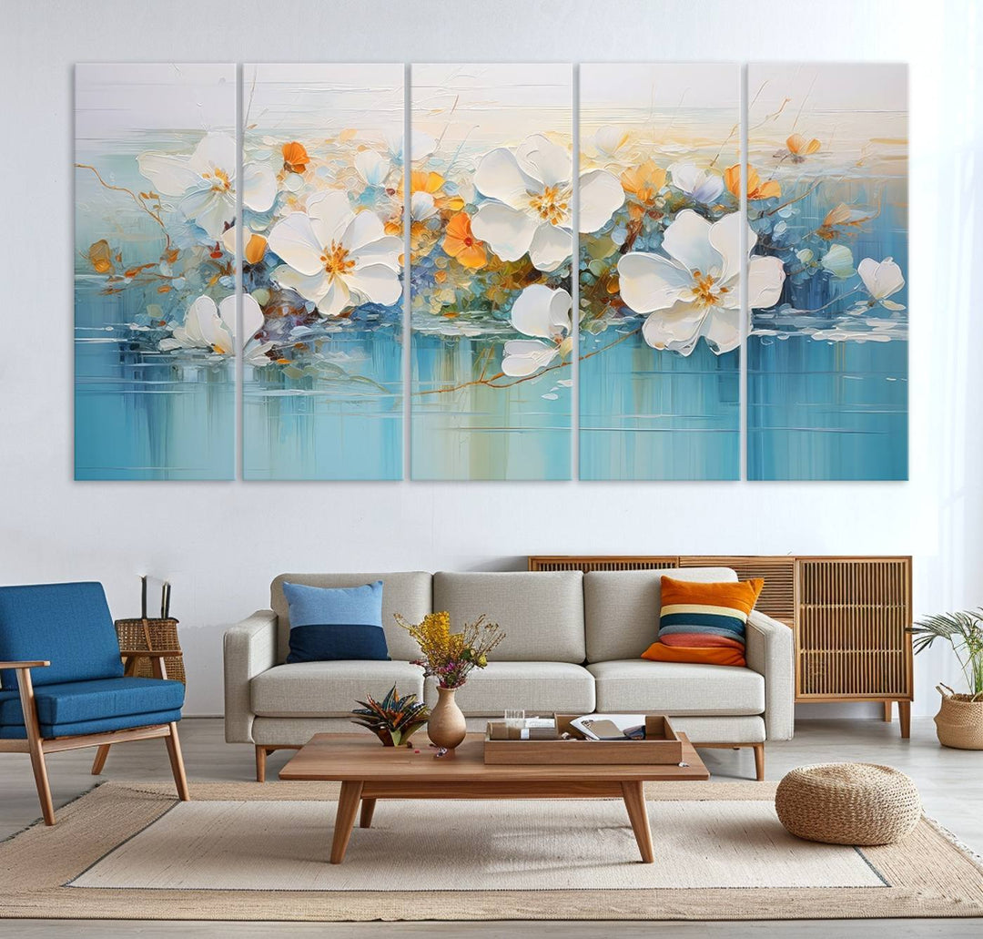 An Abstract Flower Wall Art Canvas Print in blue and orange hues.