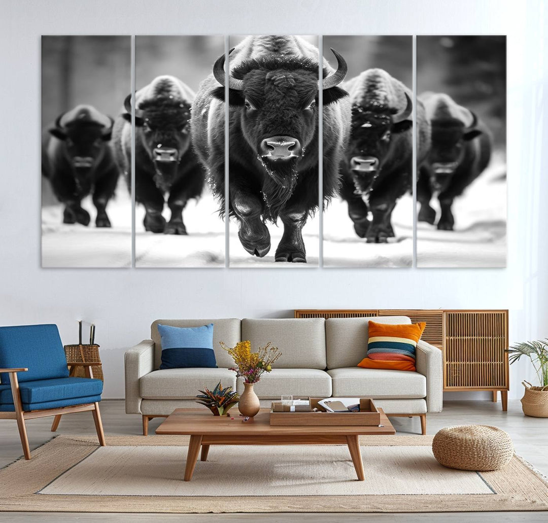 A black and white American Bison herd canvas print adorns the wall.