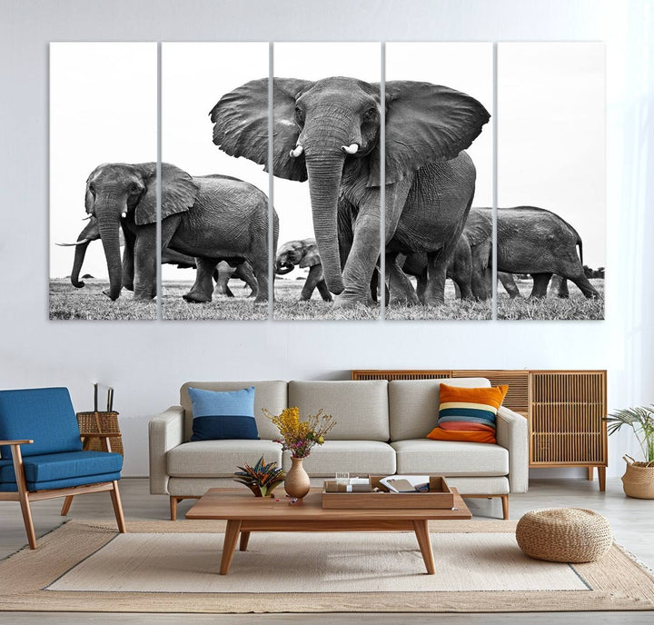 A modern dining area features a Black White Elephant Family Wall Art Canvas Print.