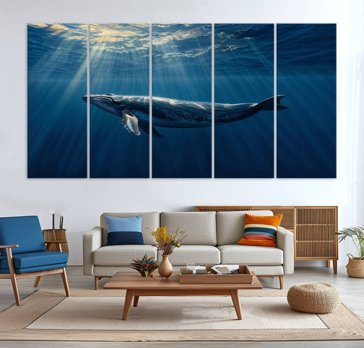 The Whale under Ocean wall art canvas print graces the white wall.