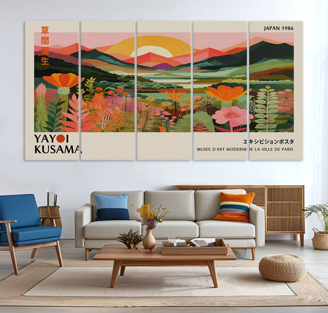 The Yayoi Kusama Landscape Canvas Print, featuring vibrant floral mountains and sunset scenery, enhances the room.