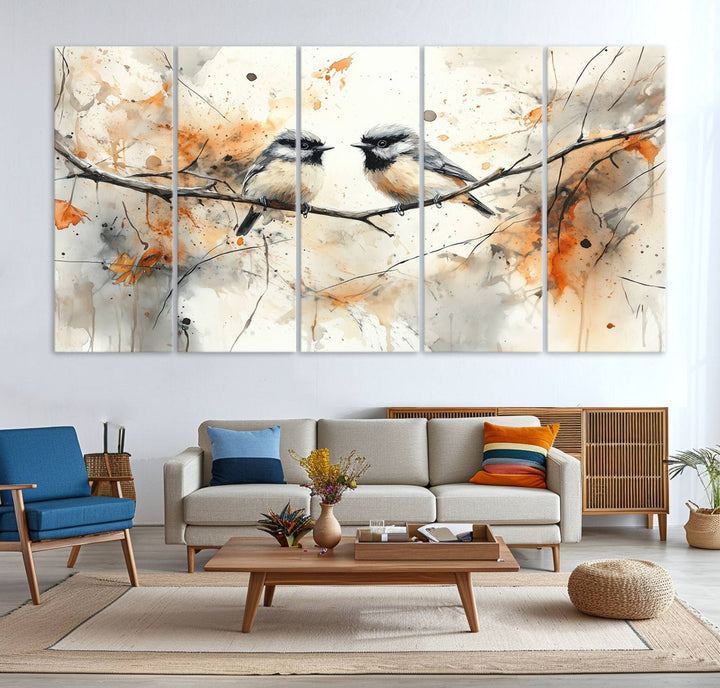 The living room features abstract watercolor chickadee bird art on the wall.