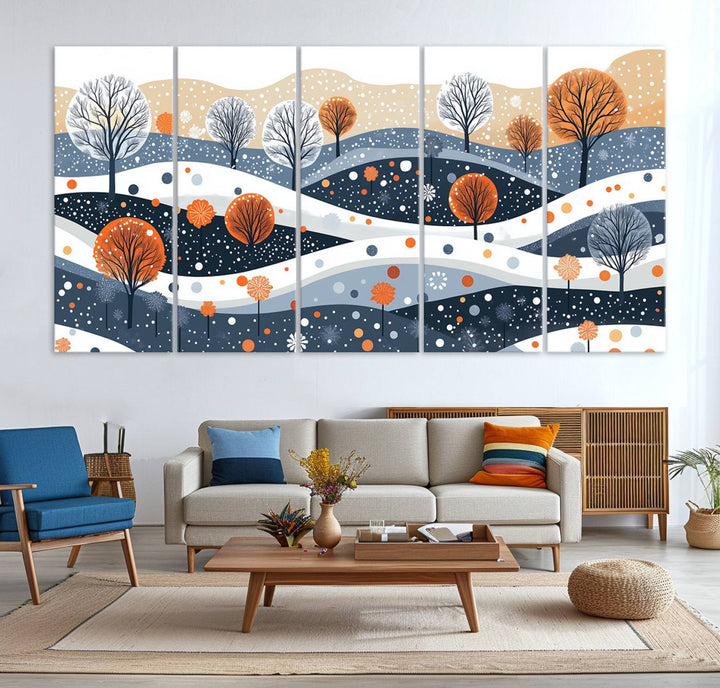 The "Abstract Winter Landscape Canvas Wall Art Print," featuring a triptych of landscapes with trees and hills in vibrant orange, white, and blue hues, adds a gallery-quality finish that transforms the space into an art lover's dream.